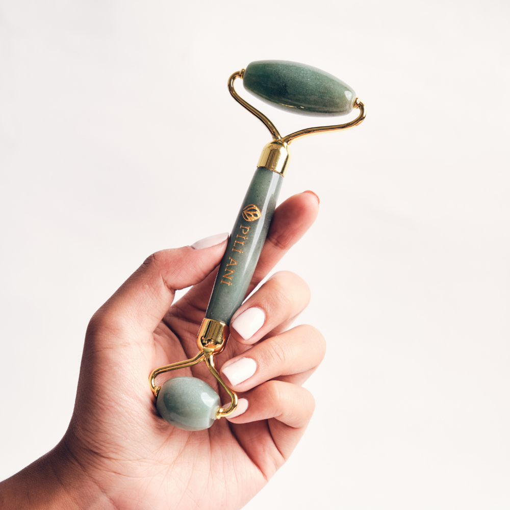 Pili Ani Jade Beauty Roller for reducing puffiness, boosting absorption, and refreshing skin naturally