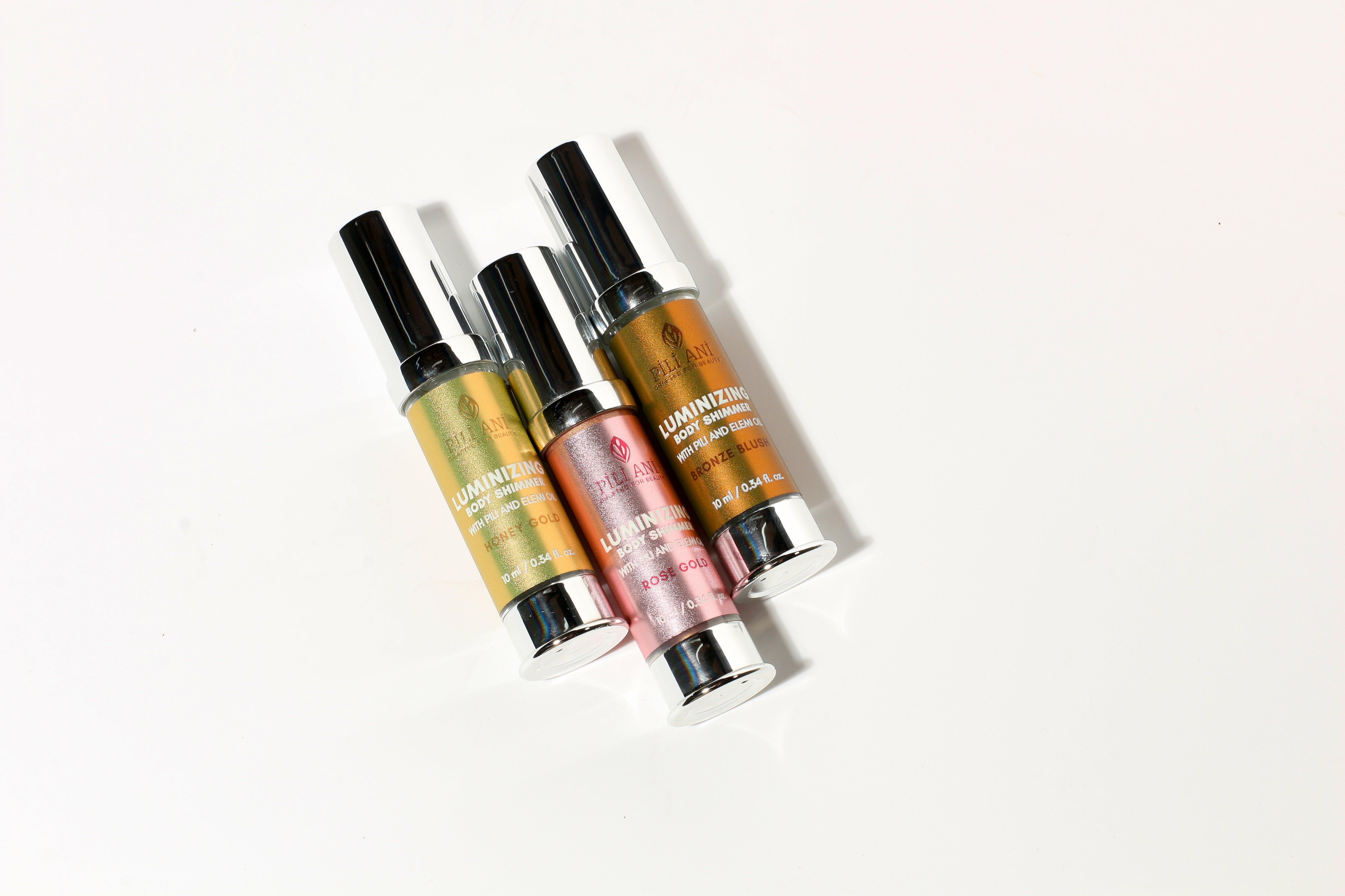 Sun-kissed body oil, Natural body shimmer, Moisturizing shimmer oil, Tropical glow body oil, Shimmer oil for skin, Body shimmer for women, Vegan body shimmer, Radiance body set, Shimmering beauty oil, Illuminating body care, Pili oil-infused body shimmer, Shimmer body care mini set, Natural body illuminator, Body shimmer oil for glowing skin, Mini travel shimmer kit, Glowing skin body essentials, Hydrating and glowing body oil, Lightweight luminizing oil, Radiance-enhancing shimmer set