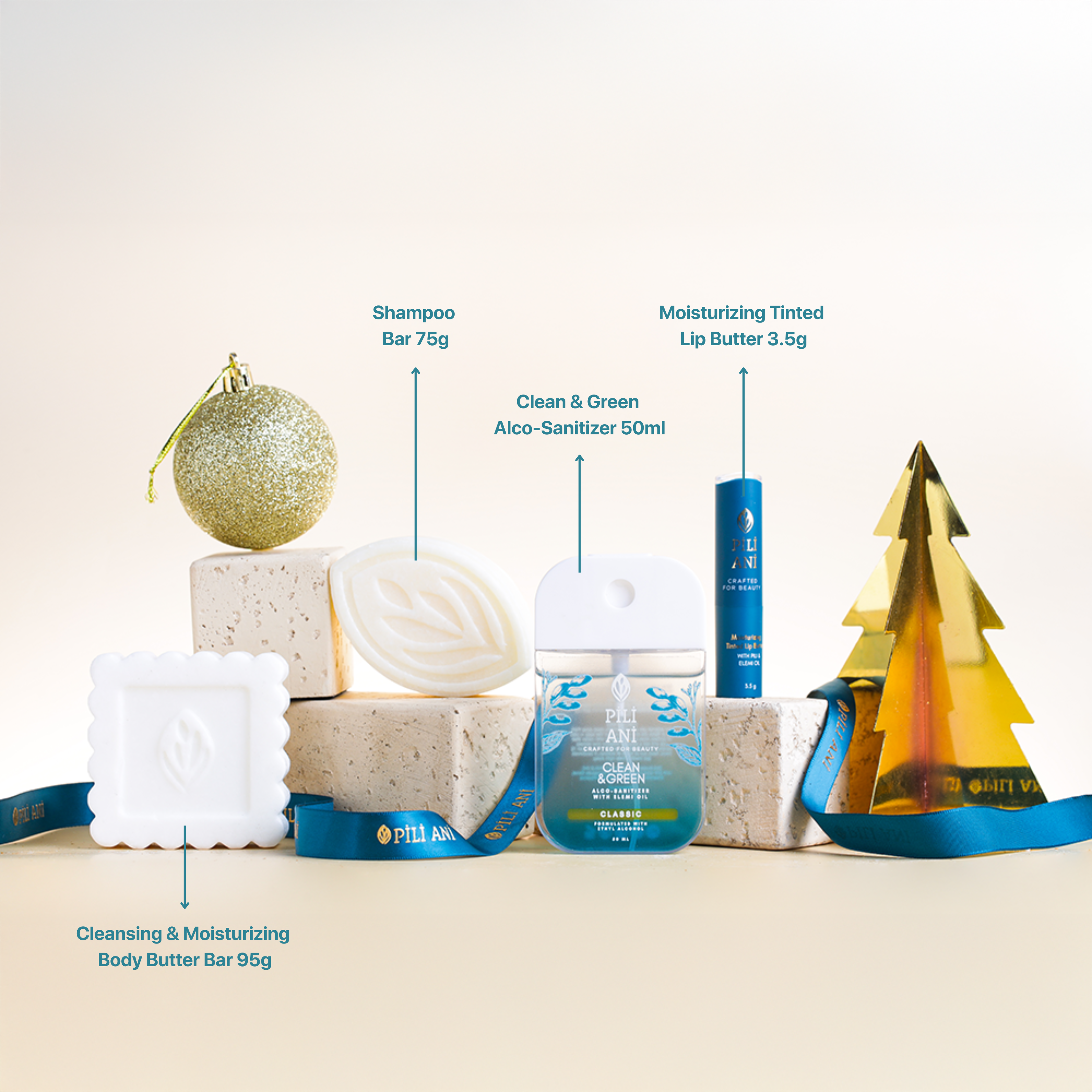 Daily Bloom Box Set containing Clean & Green Alco-Sanitizer 50ml, Shampoo Bar 75g, Cleansing & Moisturizing Body Butter Bar 95g, and Moisturizing Tinted Lip Butter 3.5g – daily skincare essentials for hydration and natural glow.